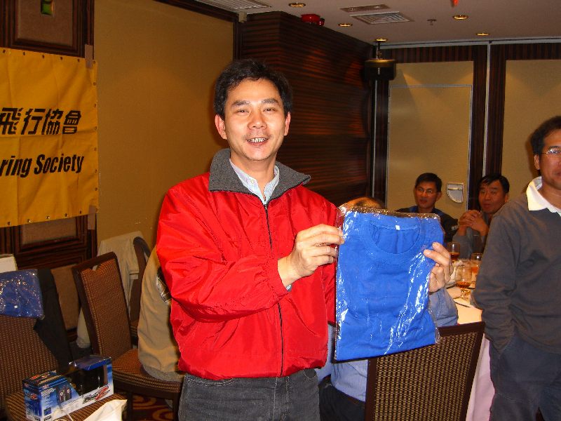 Ah Fu is happy to receive a T-shirt too!