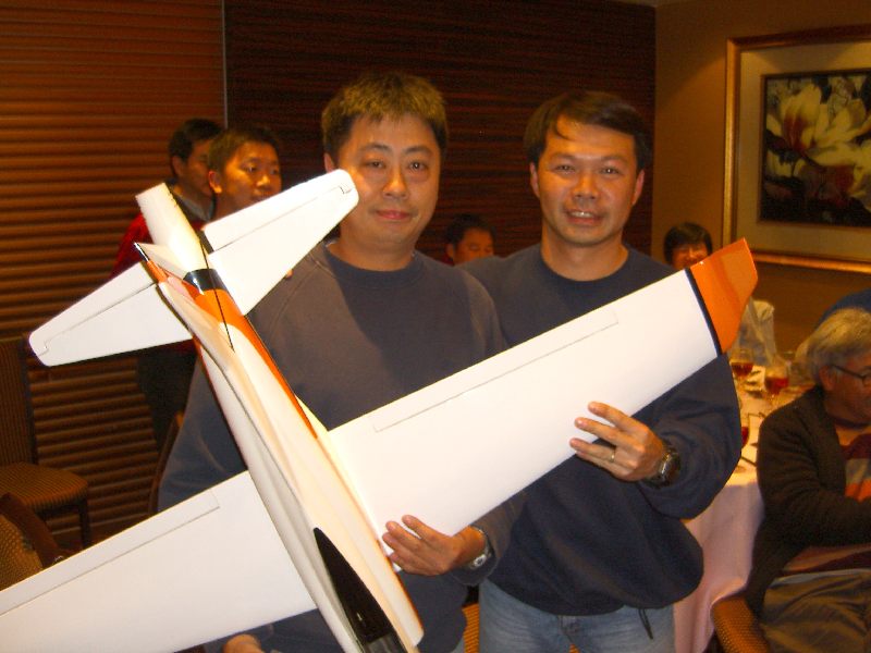 Zman has a photo with his prize sponsor - Ah Kin